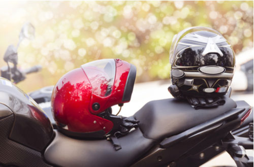Motorcycle with helmet, Boise motorcycle accident lawyer concept