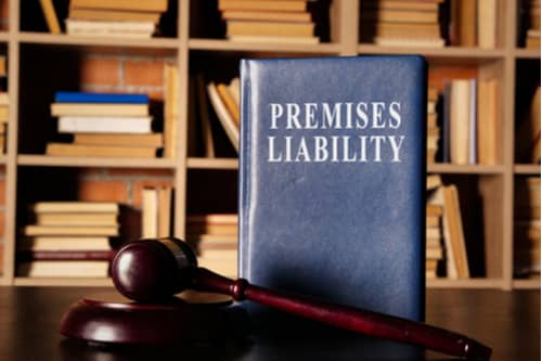 Premises liability book and judge gavel, Boise premises liability lawyer concept